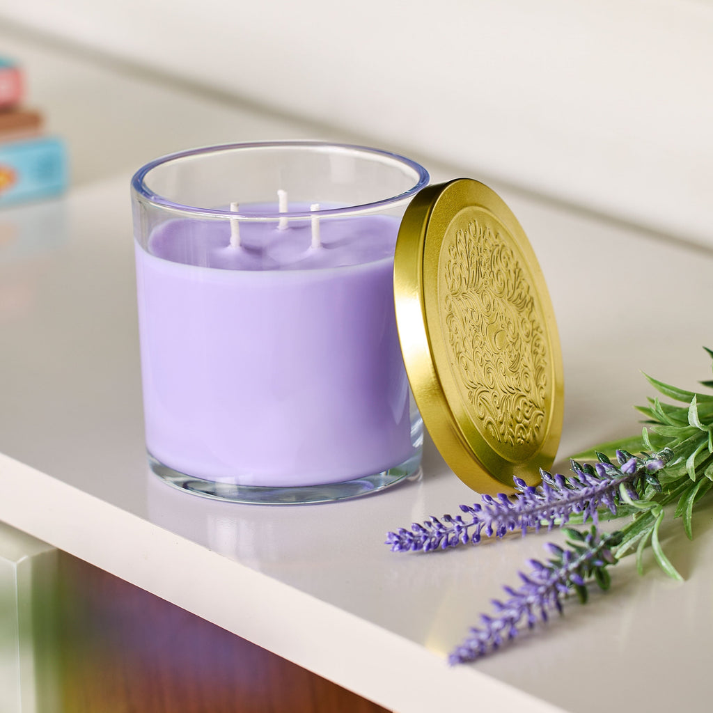 Lavender candle in a glass jar with a 14.5 oz gold lid