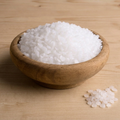 Paraffin wax beads in a wooden bowl