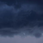 Dark stormy clouds in a night sky