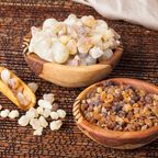 Frankincense and myrrh resin pieces in wooden bowls