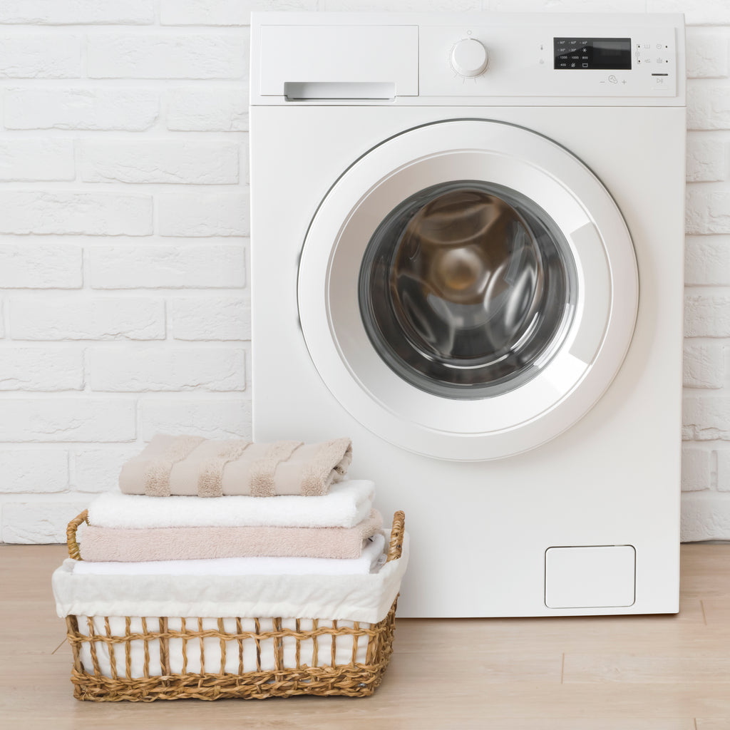 Washing machine with a basket of folded towels